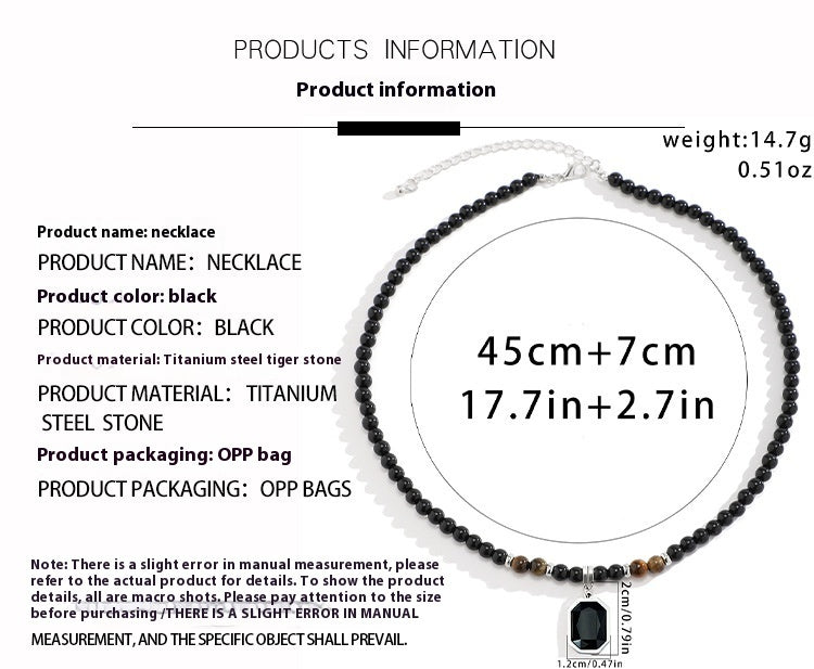 Black men's necklace with a tiger stone pendant, 45cm long, crafted from titanium and steel.
