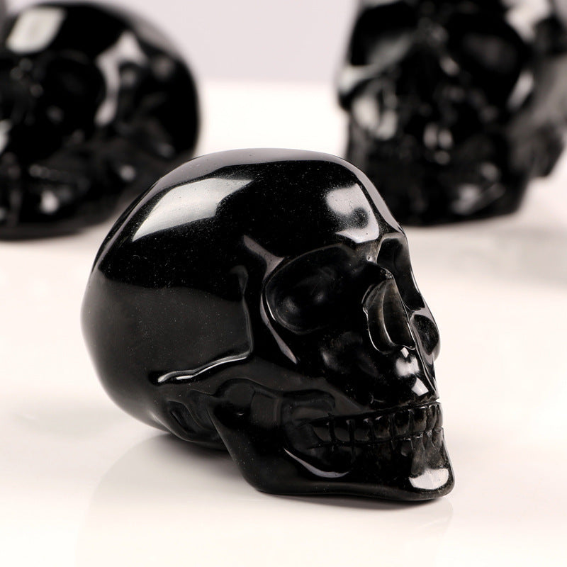 Handgefertigter Obsidian Kristallschädel aus echtem Obsidianstein, Deko- und Sammlerstück, glänzend, schwarz.