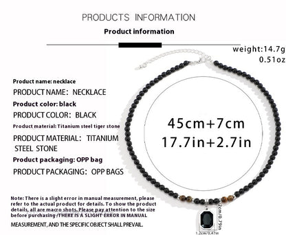 Black men's necklace with a tiger stone pendant, 45cm long, crafted from titanium and steel.