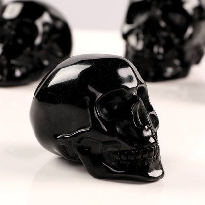 Handgefertigter Obsidian Kristallschädel aus echtem Obsidianstein, Deko- und Sammlerstück, glänzend, schwarz.